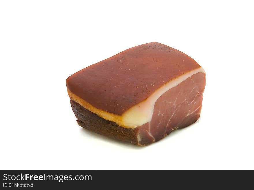 Piece of a ham on a white background. Isolated. Piece of a ham on a white background. Isolated