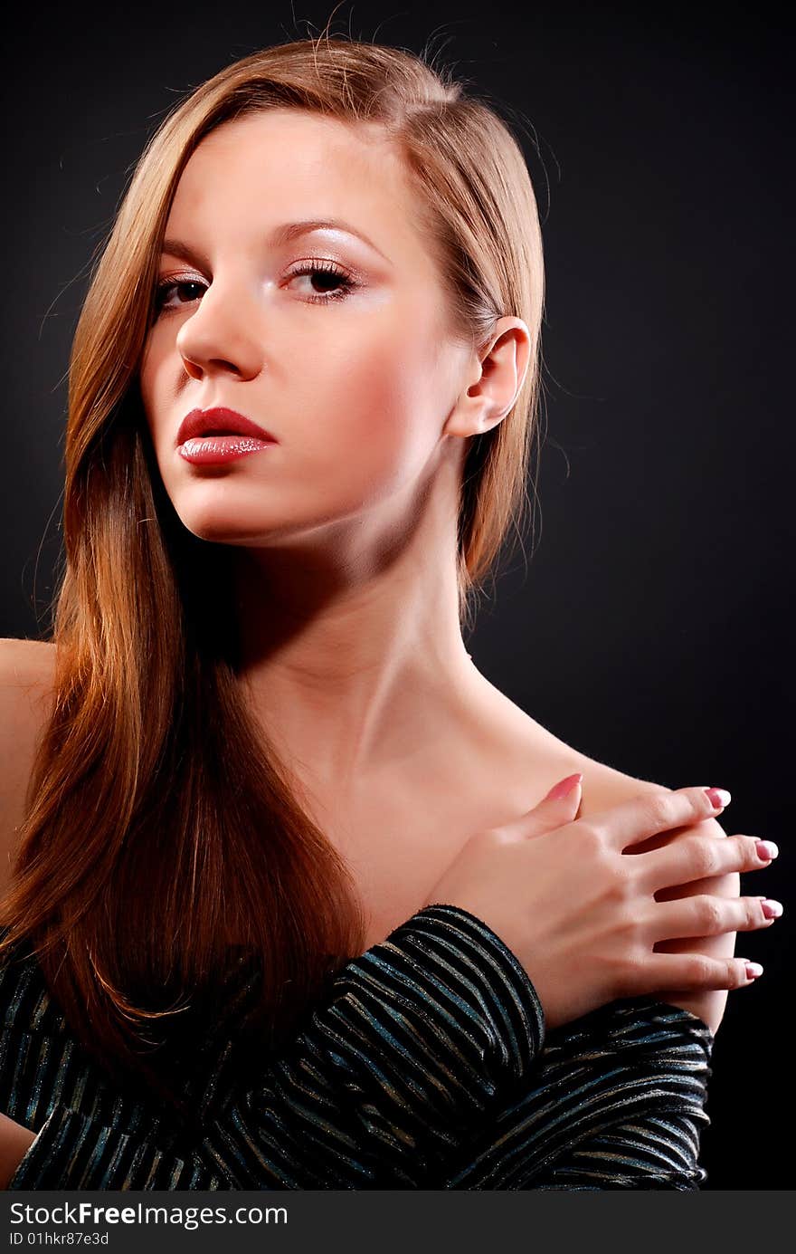 Portrait of young beautiful woman with long hair