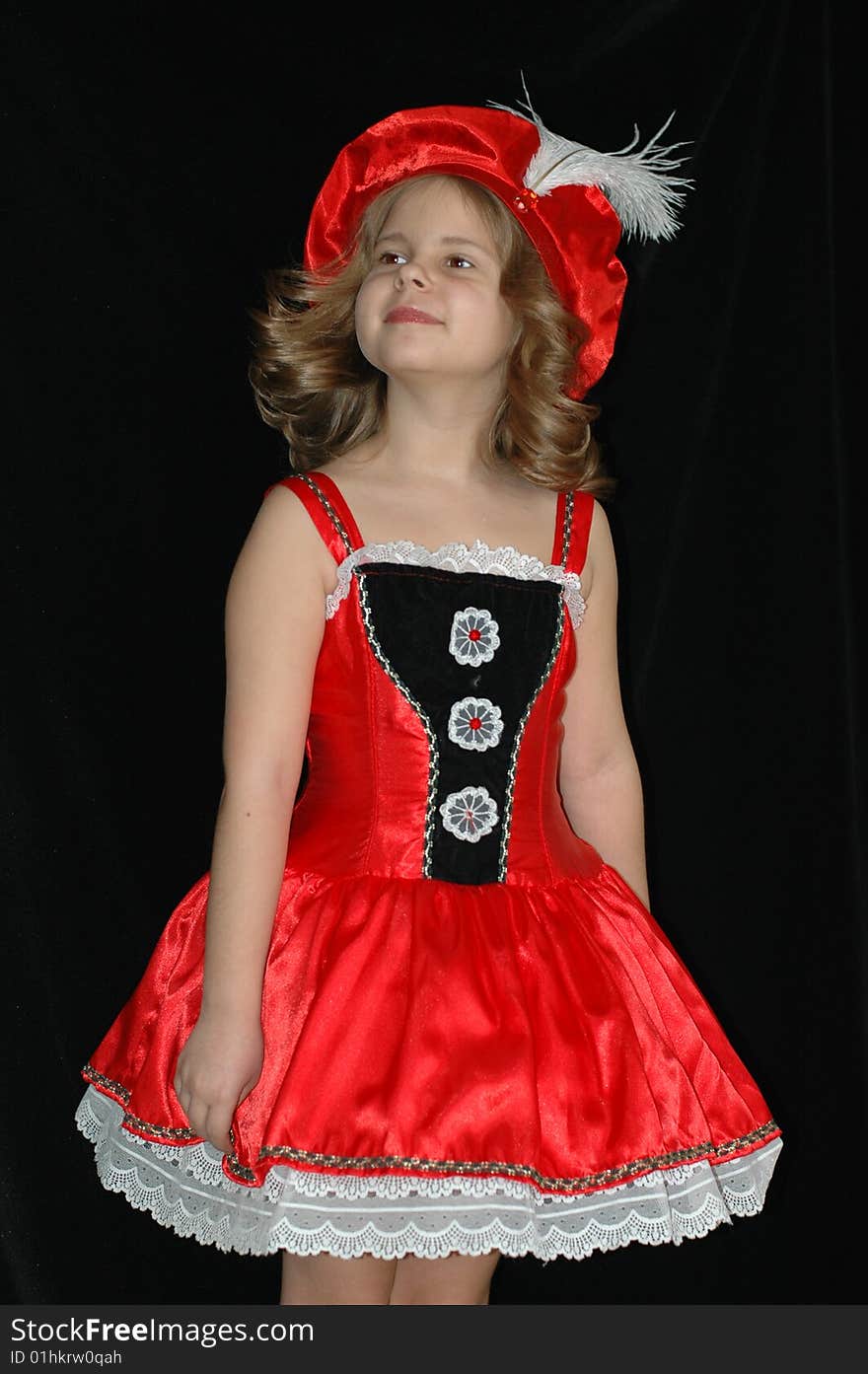 Girl in red dress and hat