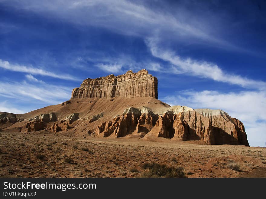 View of the red rock formations in San Rafael Swell with blue sky�s and clouds