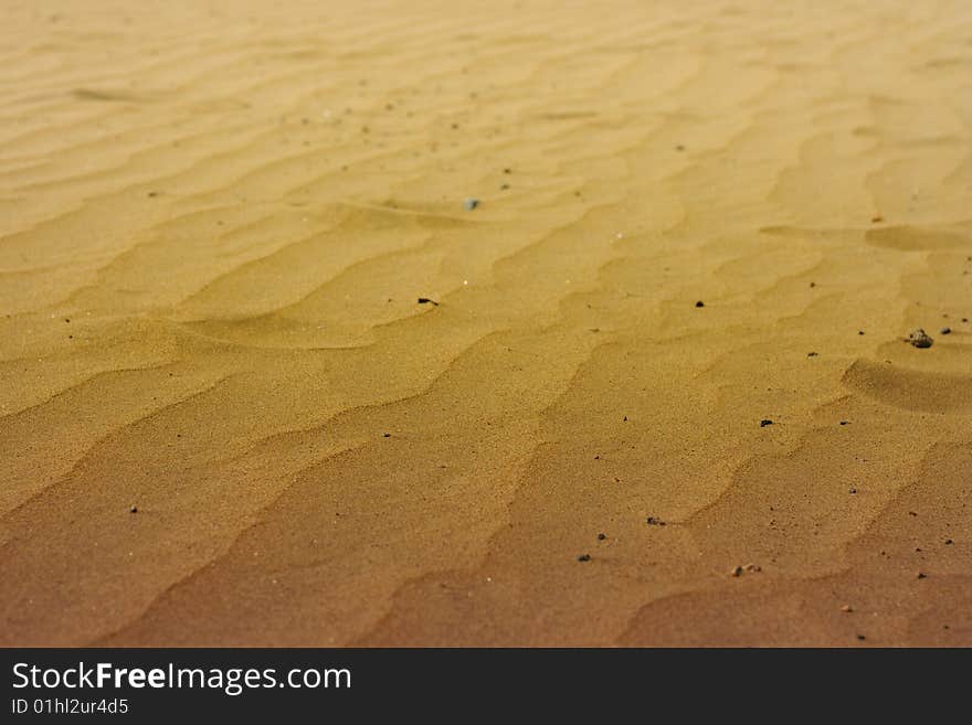 A photo of the warm texture of a desert. A photo of the warm texture of a desert.