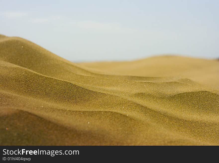 A photo of the warm texture of a desert. A photo of the warm texture of a desert.