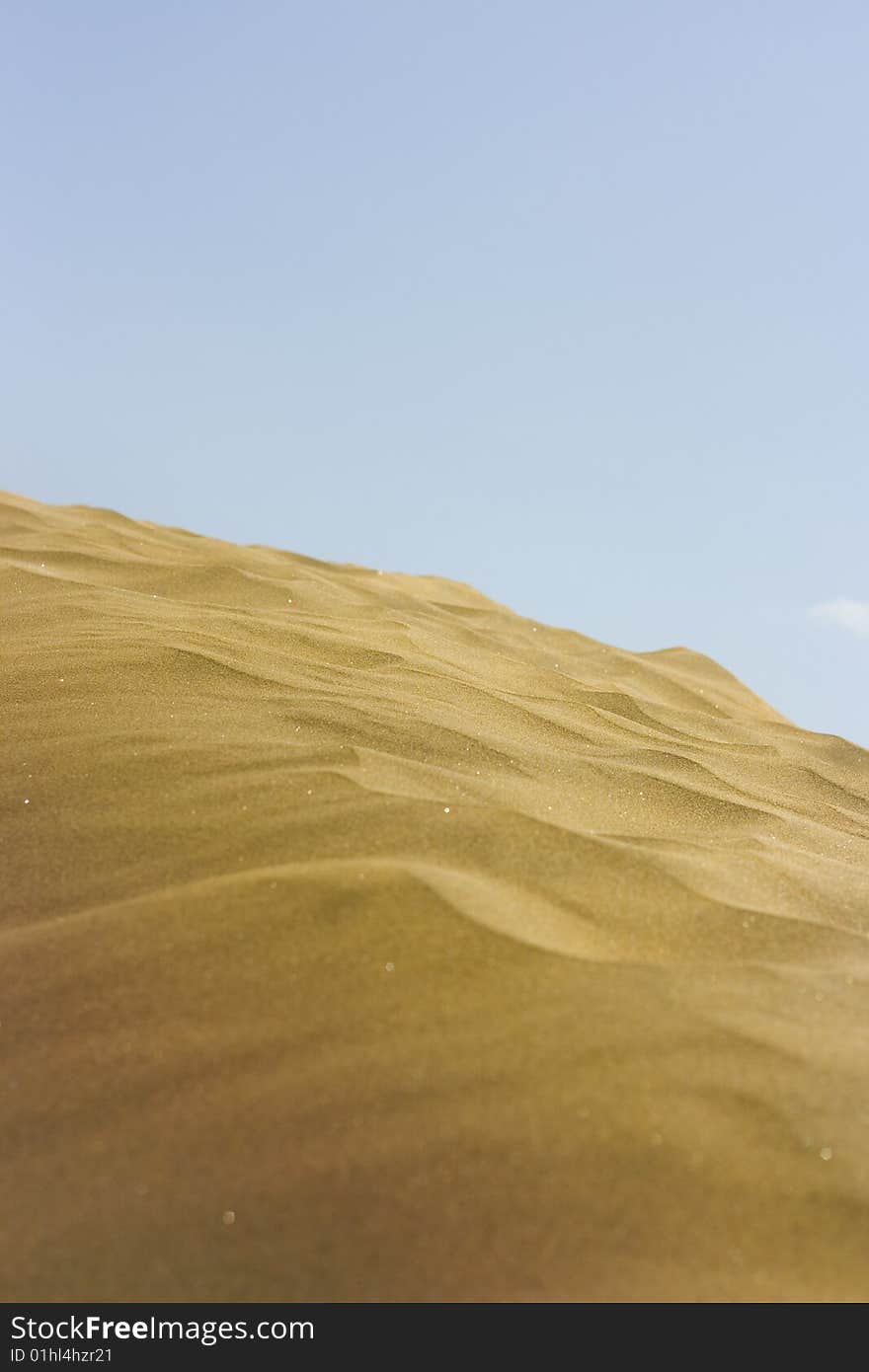 A photo of the warm texture of a desert. A photo of the warm texture of a desert.