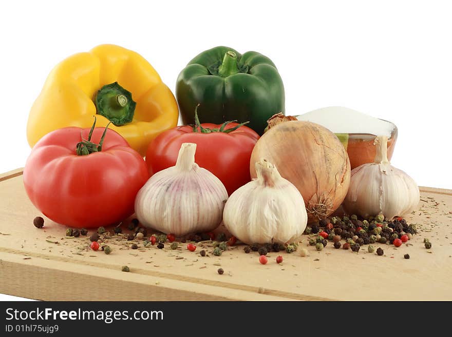 Some healthy food products presented on a wooden tablet ready to be prepared. Some healthy food products presented on a wooden tablet ready to be prepared