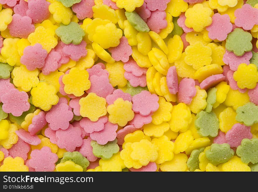 A close-up of a lot of colourful sugar decoration