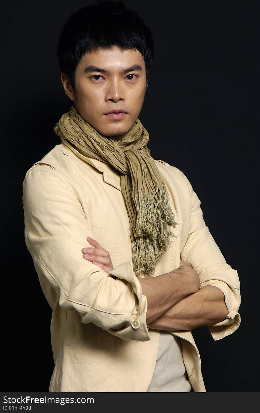 Studio picture of a young man dressed for winter on black background. Studio picture of a young man dressed for winter on black background