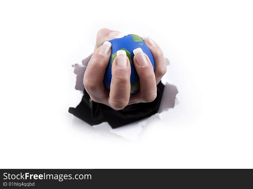 Hand holding planet thru a hole - isolated on white background