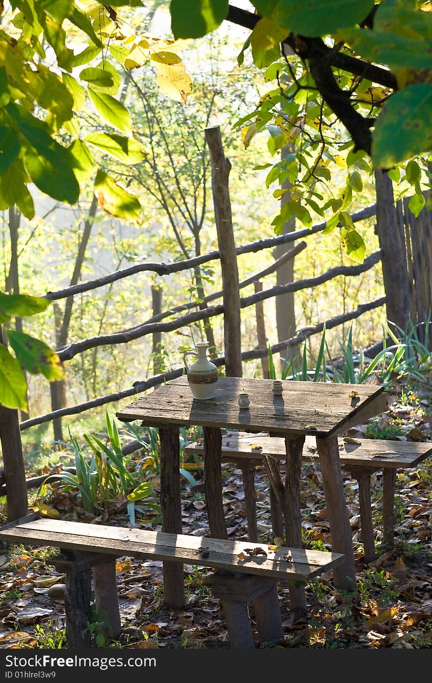 Rustic table with water pot