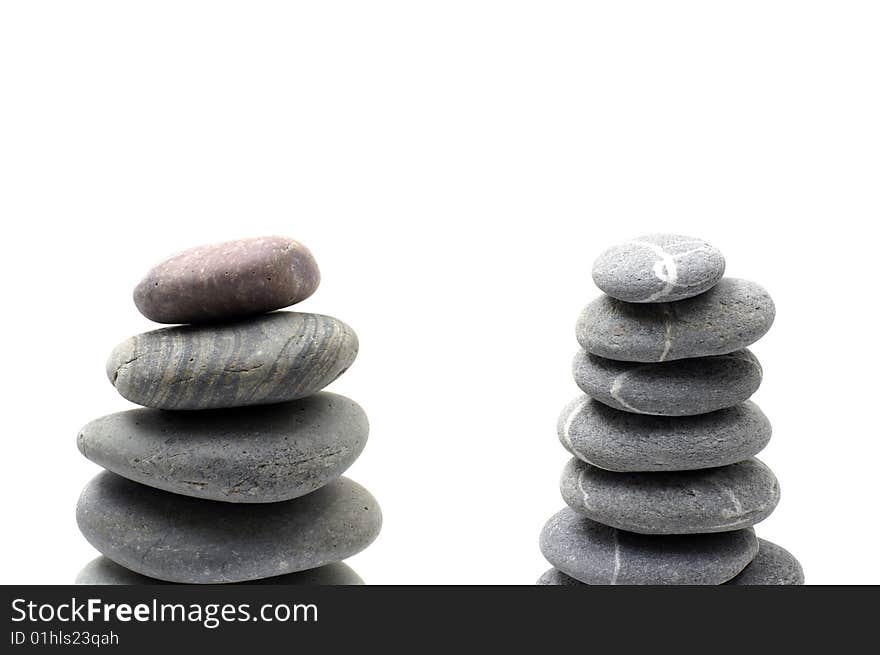 Stack of smooth pebbles over white background. Stack of smooth pebbles over white background