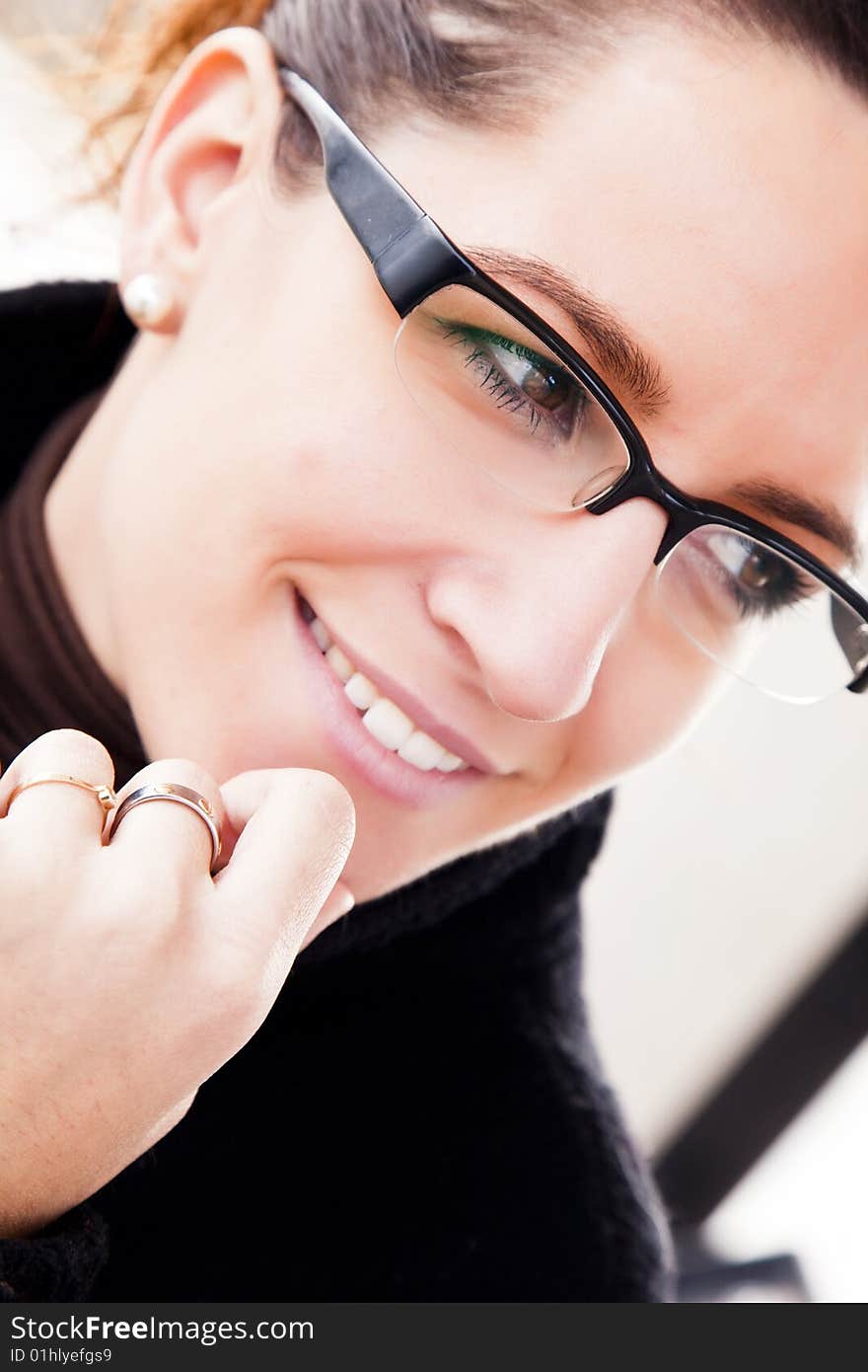 Young woman close portrait using glasses. Young woman close portrait using glasses