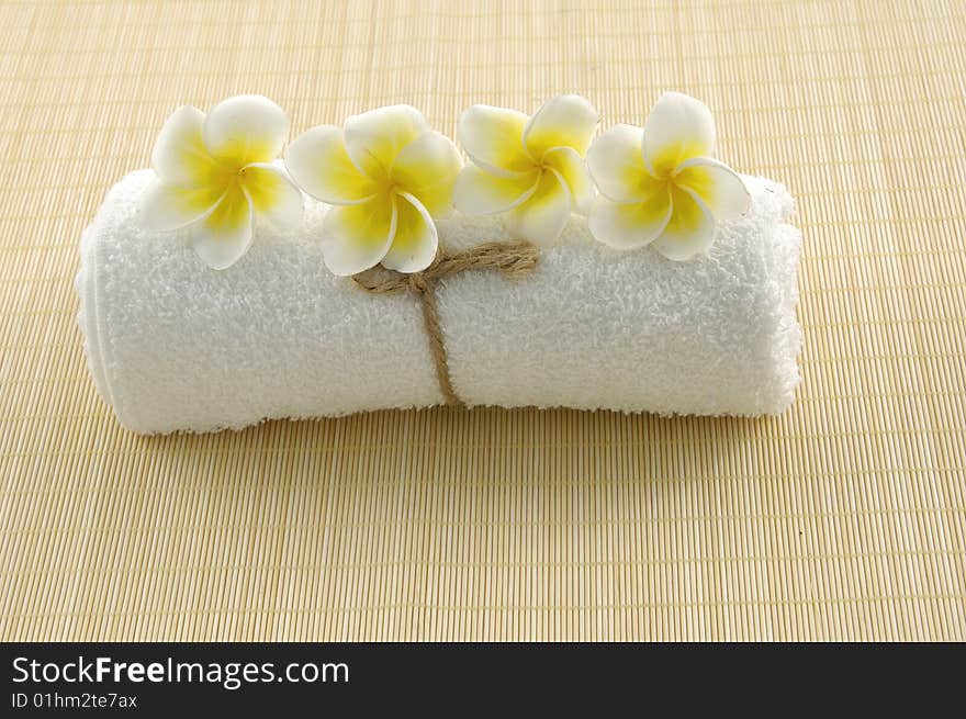 Balanced stones with frangipani flower. Balanced stones with frangipani flower