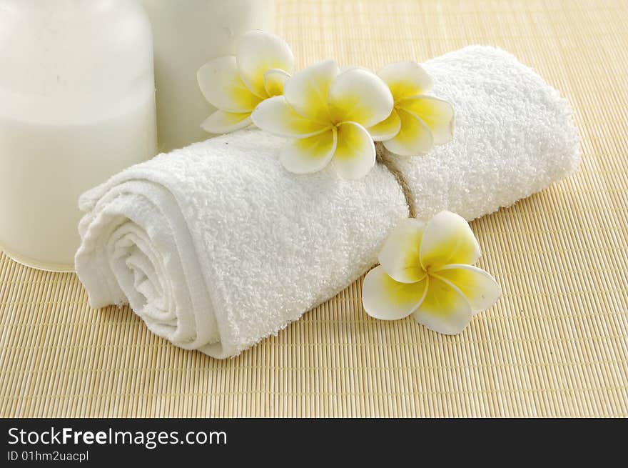 Balanced stones with frangipani flower. Balanced stones with frangipani flower