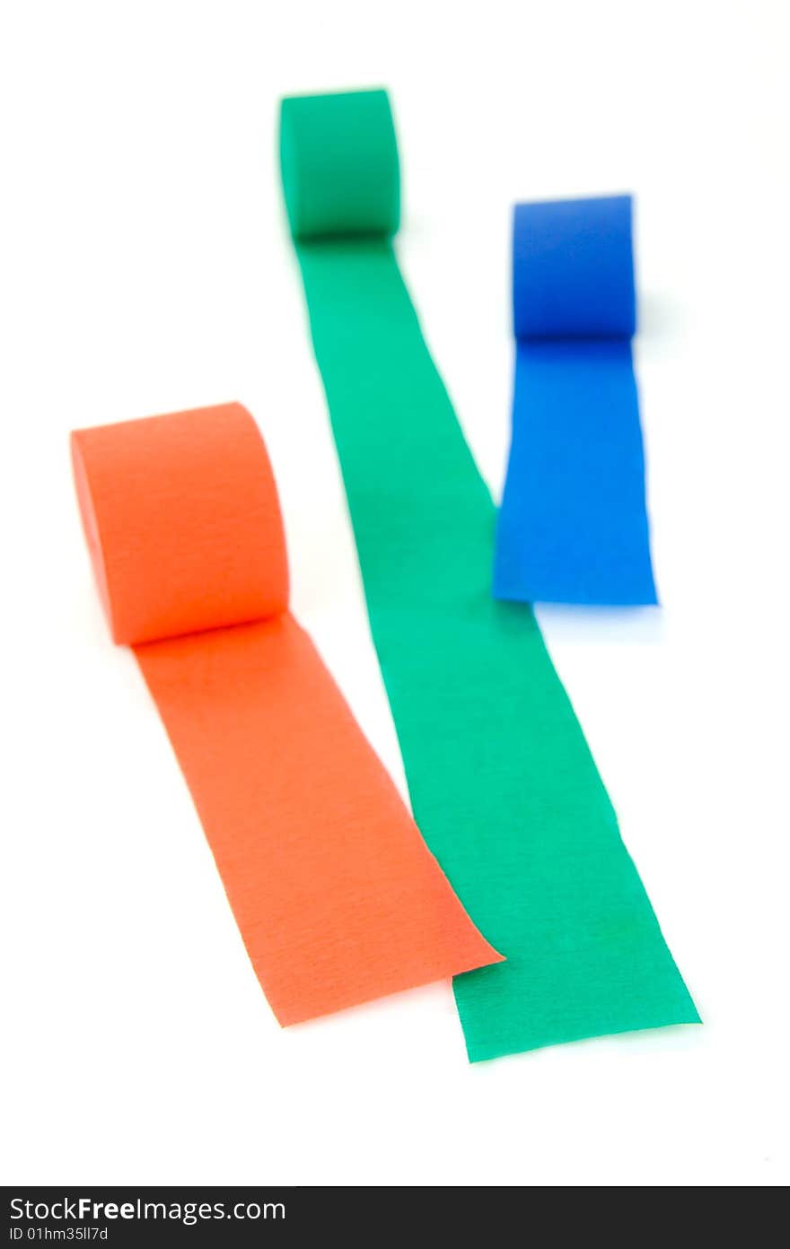 Colored streamers isolated against a white background