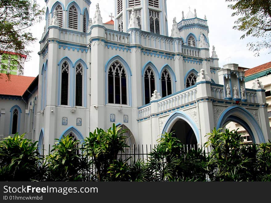 Neo-gothic facade with light blue trim of the imposing St. Joseph's Church which dates to 1912 in Singapore - Lee Snider Photo. Neo-gothic facade with light blue trim of the imposing St. Joseph's Church which dates to 1912 in Singapore - Lee Snider Photo.