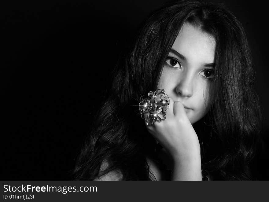 Series. Portrait of the beautiful brunette in a dark blue dress