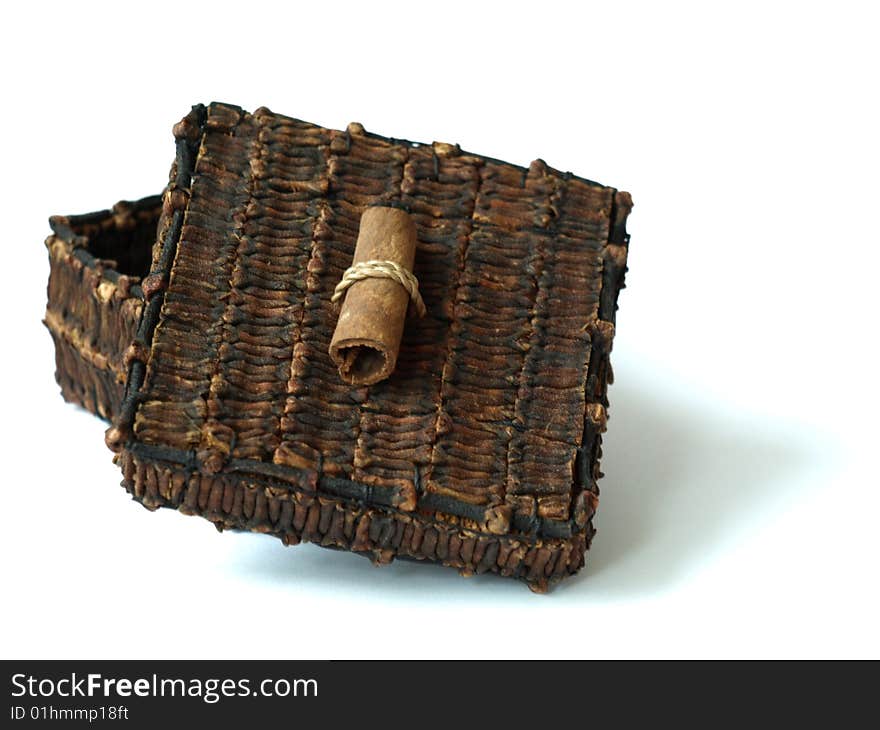 Beautiful box made of cloves and decorated with a cinnamon stick. Beautiful box made of cloves and decorated with a cinnamon stick