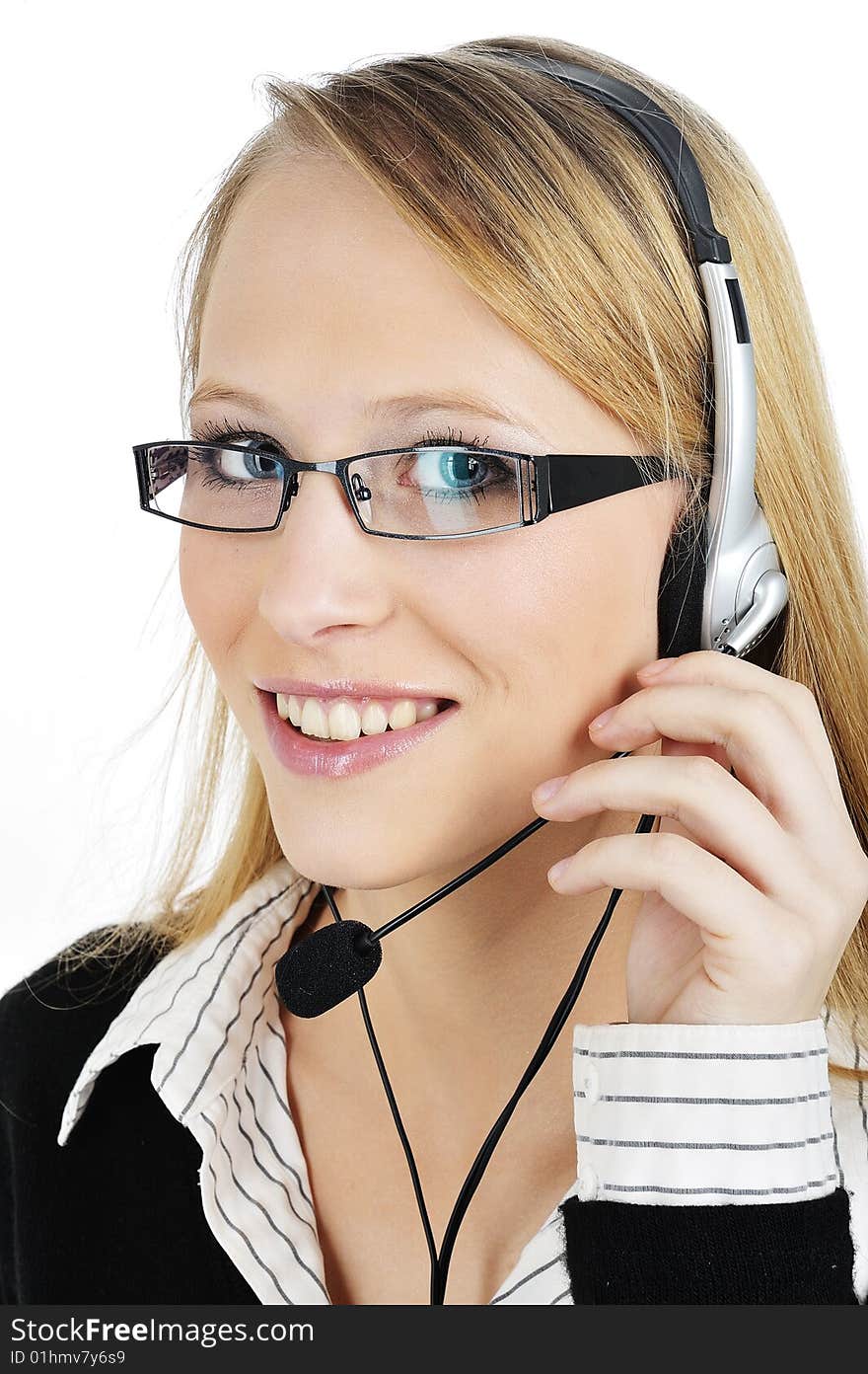 Friendly Customer Representative with headset smiling during a telephone conversation