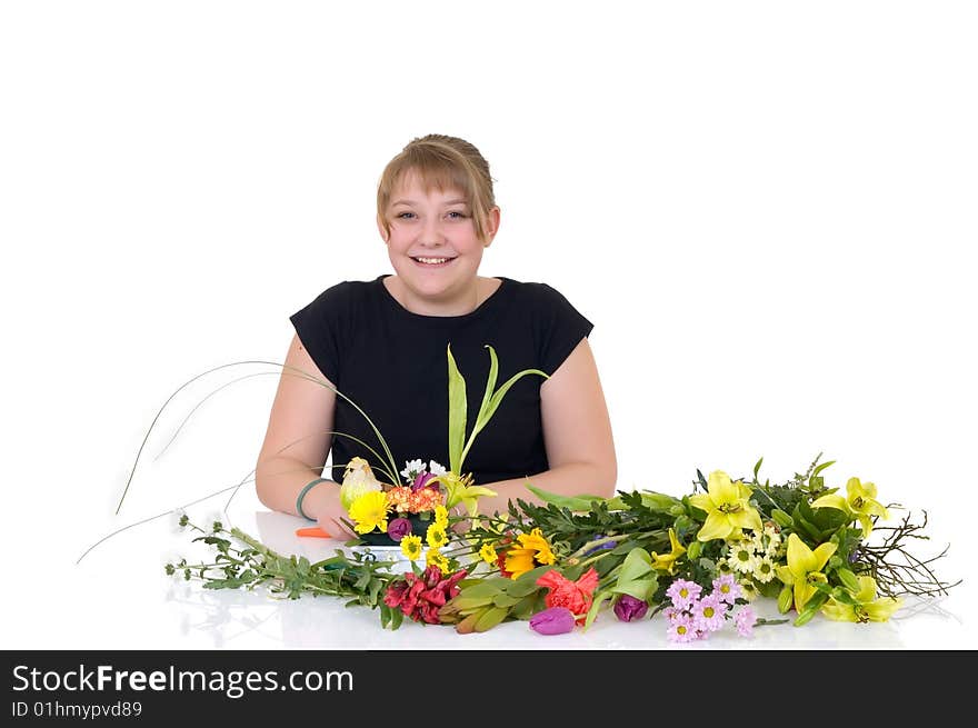 Young girl arranging flowers