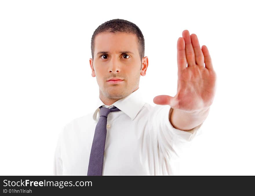 Young professional showing stopping gesture with white background