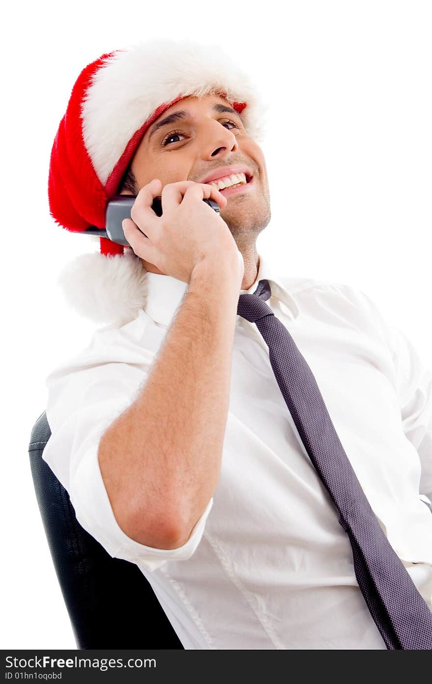 Young caucasian busy on phone call on an isolated white background