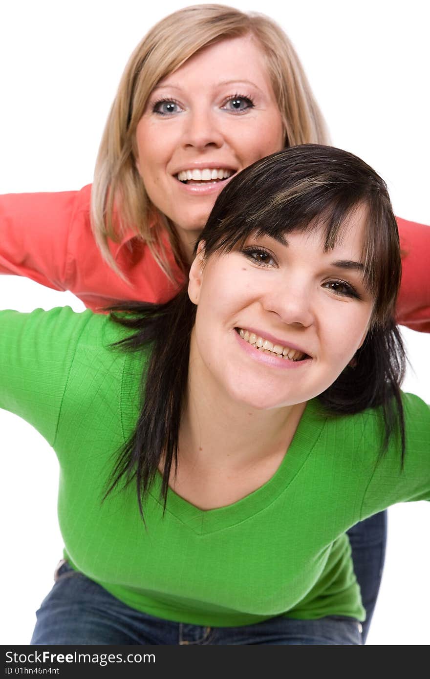 Two crazy women in friendship. over white background. Two crazy women in friendship. over white background