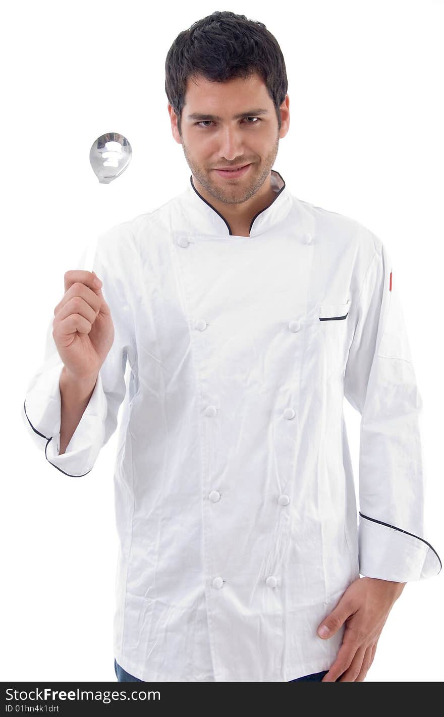 Young Chef Holding Slotted Spoon