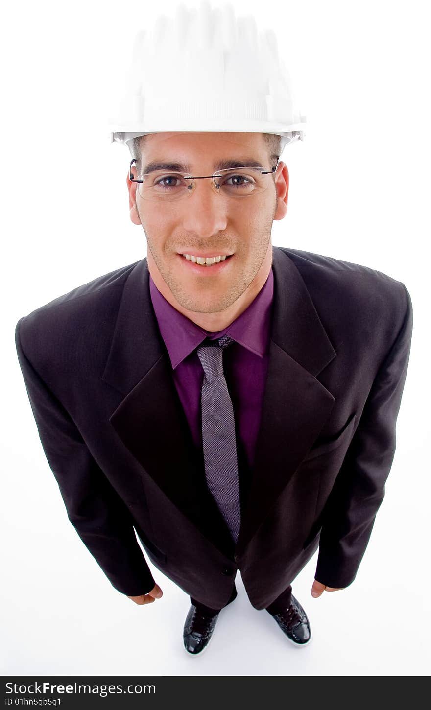 High angle view of young male architect against white background