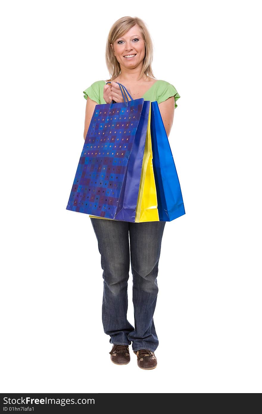 Attractive woman with shopping bag. over white background