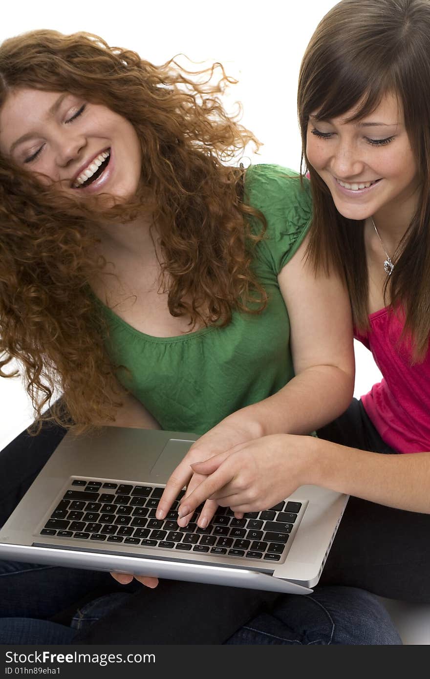 Two teenagers with laptop computer