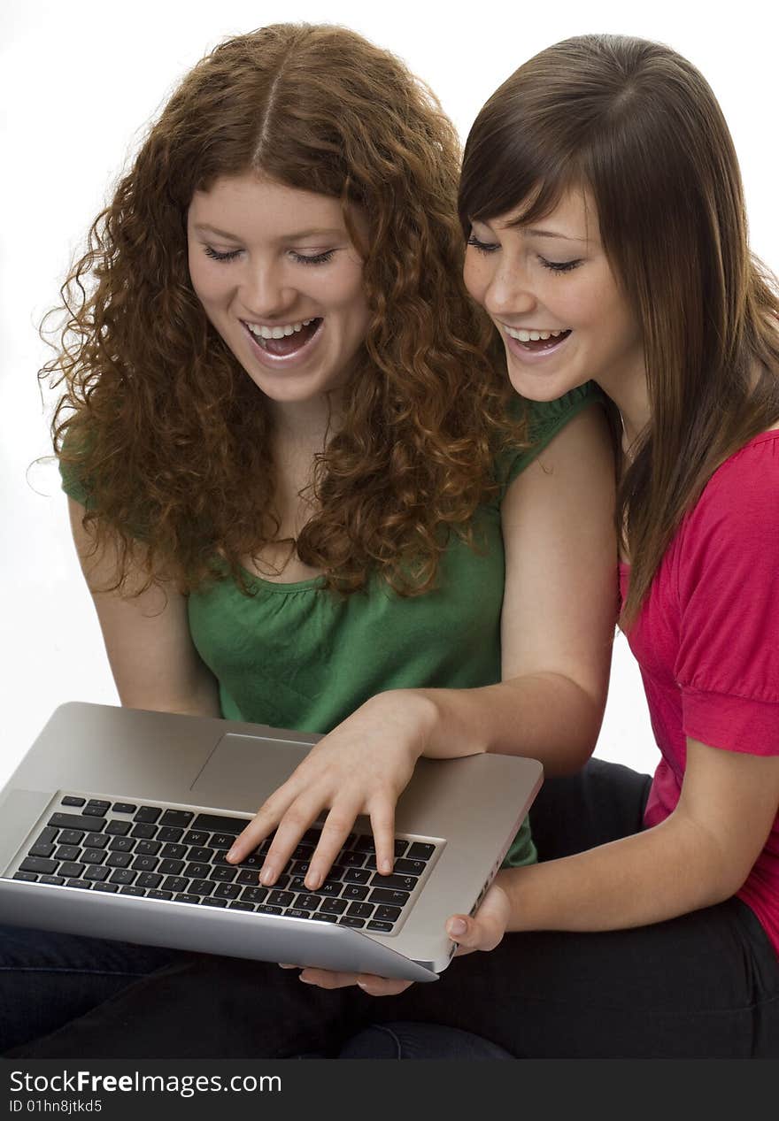 Two teenagers with laptop computer