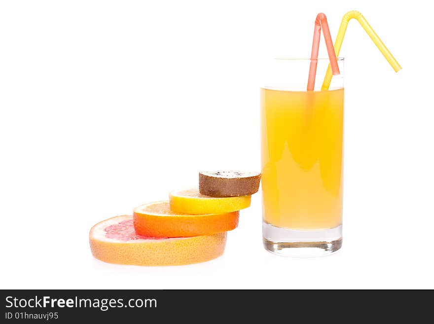 Juice in glass with orange, grapefruit, kiwi and lemon on a white background