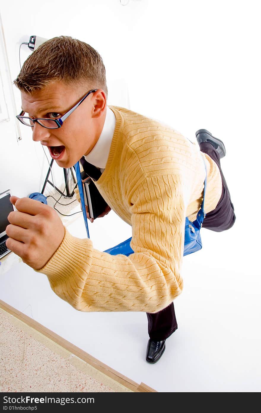 Young Student Carrying Bag And Books