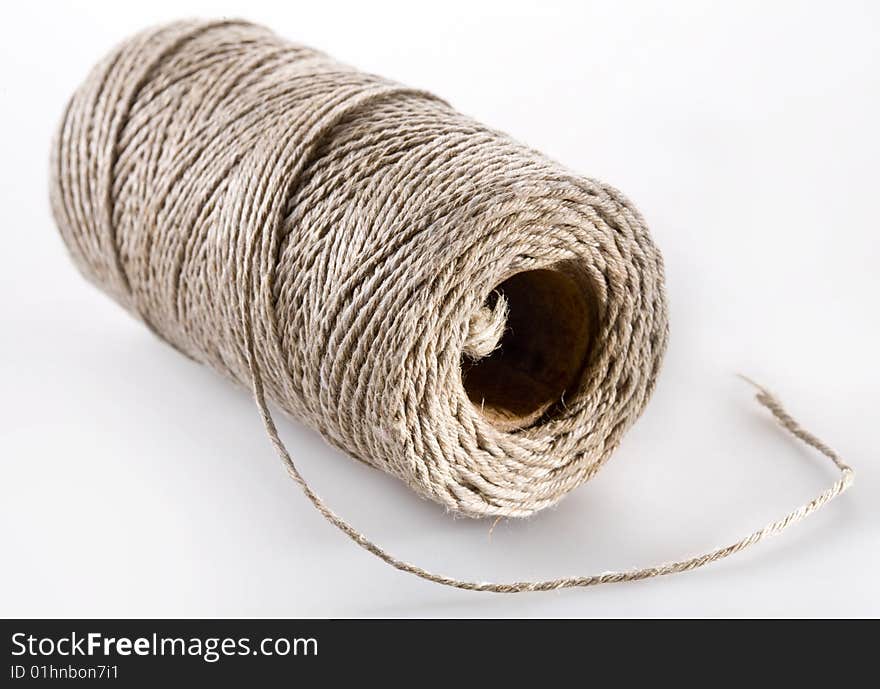 Spool of threads on a white background. Spool of threads on a white background.