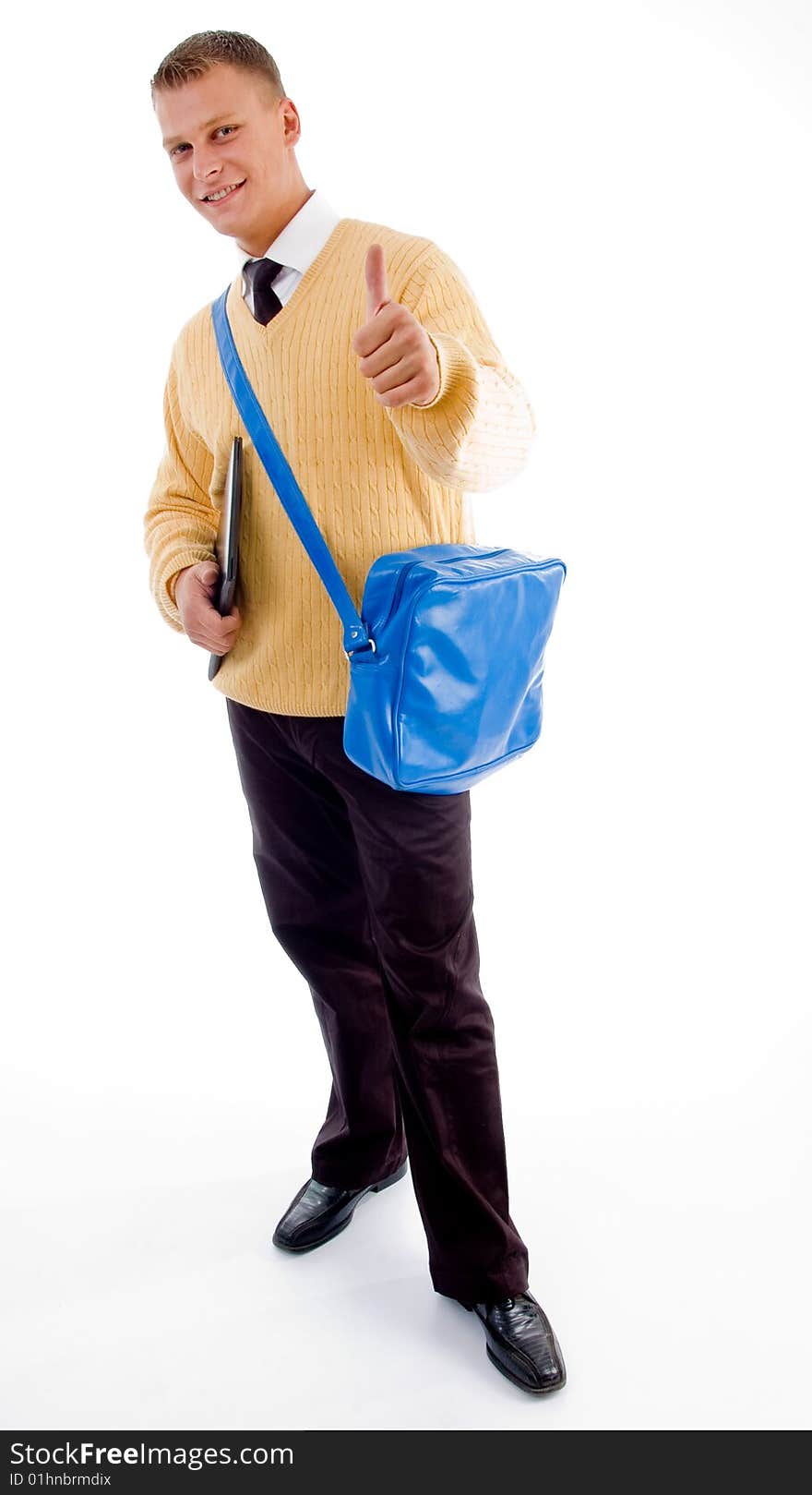 Young Student Standing With Books And Bag