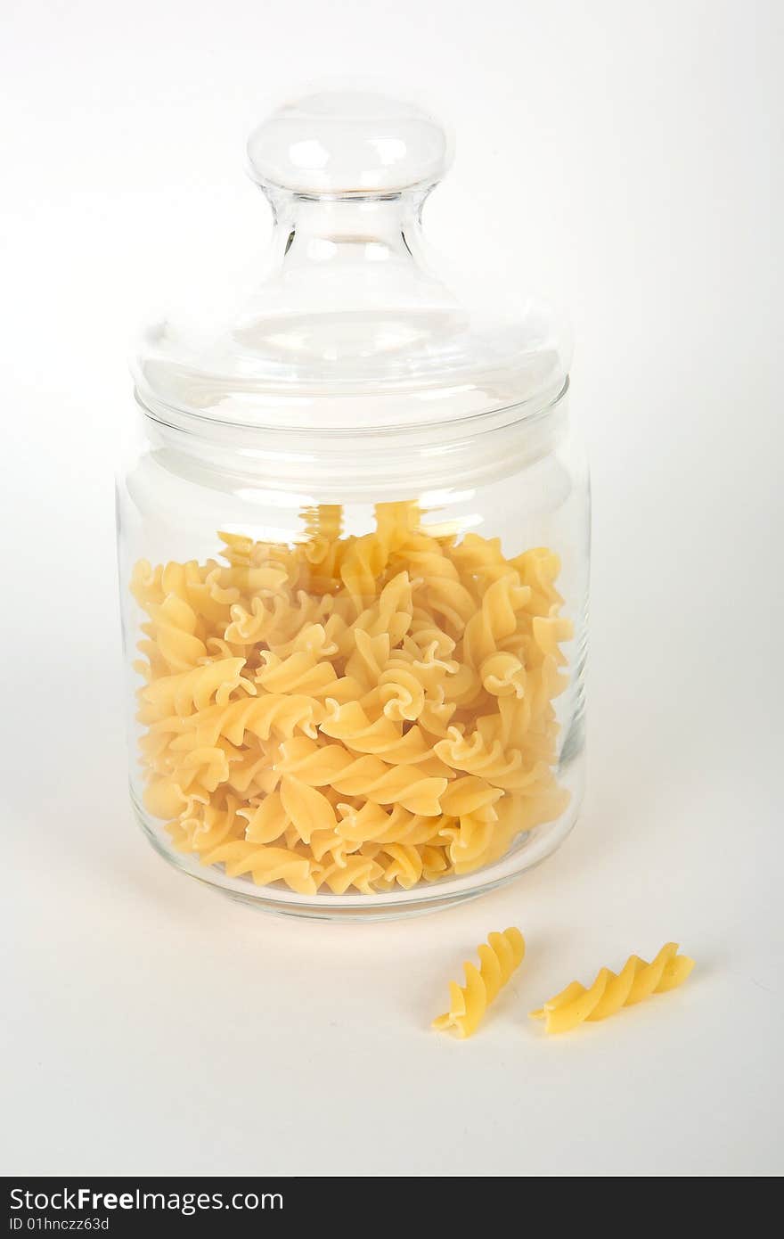 Pasta in bowl on white background