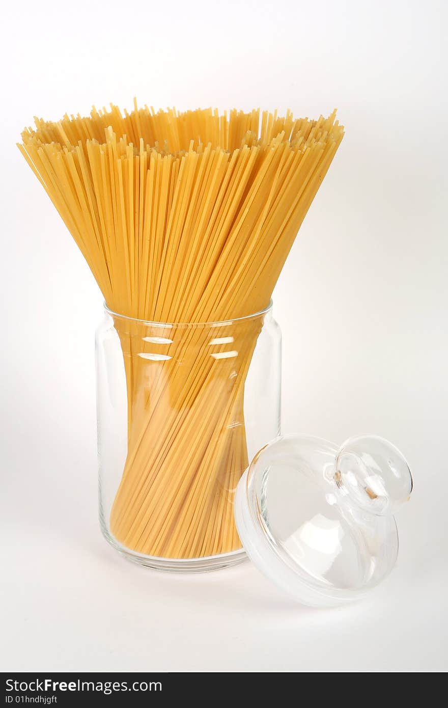 Spaghetti in bowl on white background