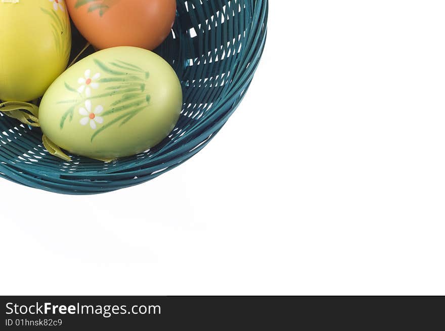 Easter eggs in a basket. Place for Your text.