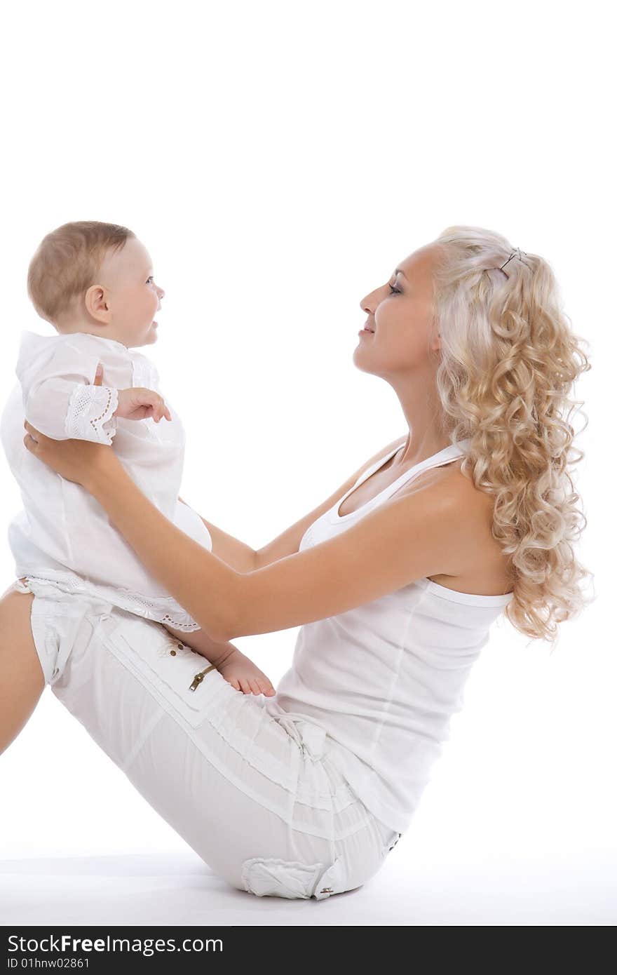 Smiling women with her little child isolated on white