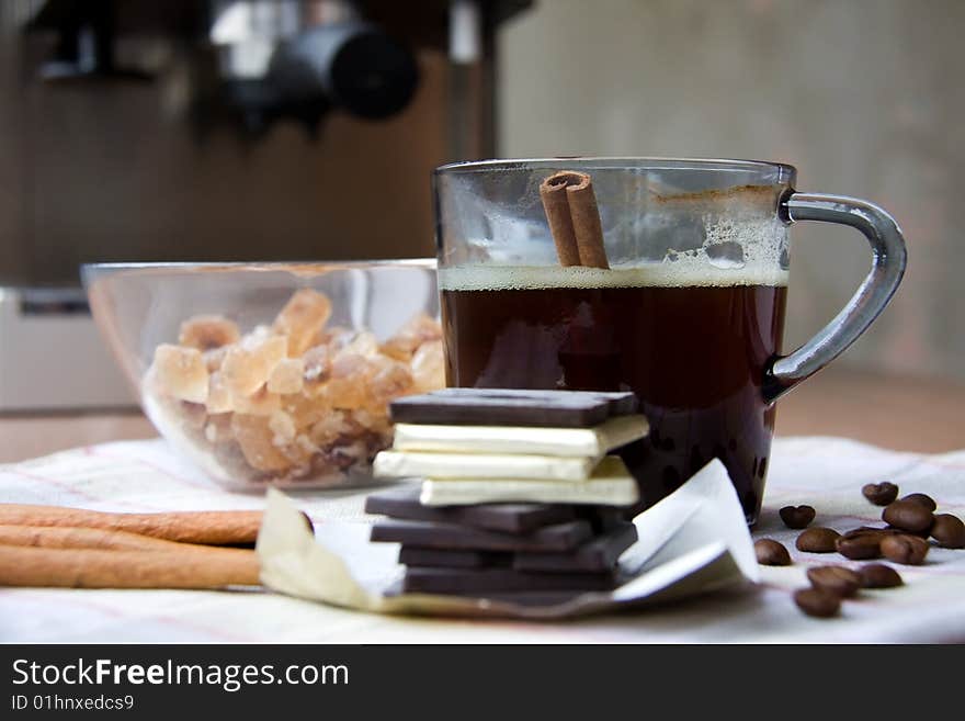 Cup of Coffee, Chocolate, Cane Sugar and Cinnamon