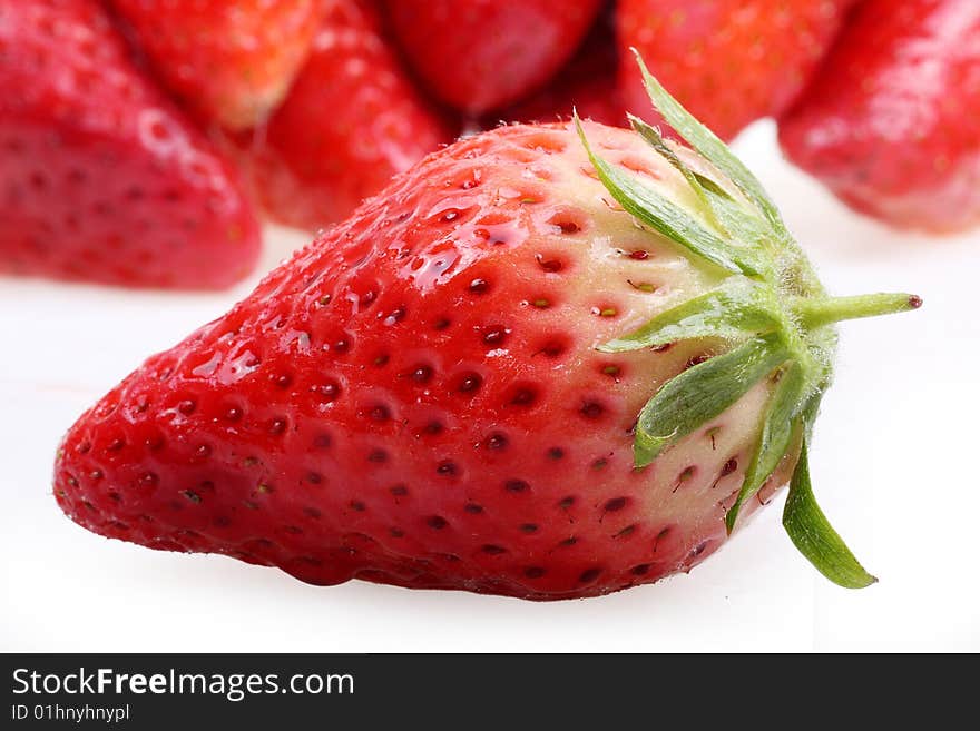 Fresh ripe strawberries on white background. Fresh ripe strawberries on white background.