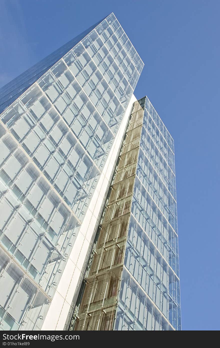 Modern office building on a background of blue sky