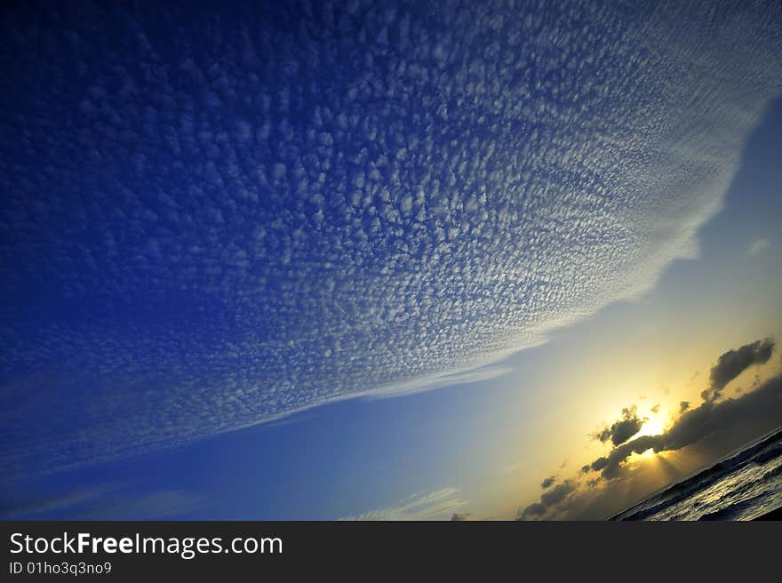 Ultra wide shot of a sunrise with cirrus cloud. Ultra wide shot of a sunrise with cirrus cloud