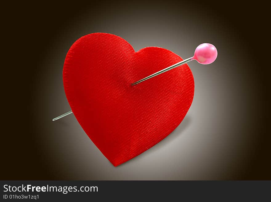 Red valentine with needle inside. Red valentine with needle inside