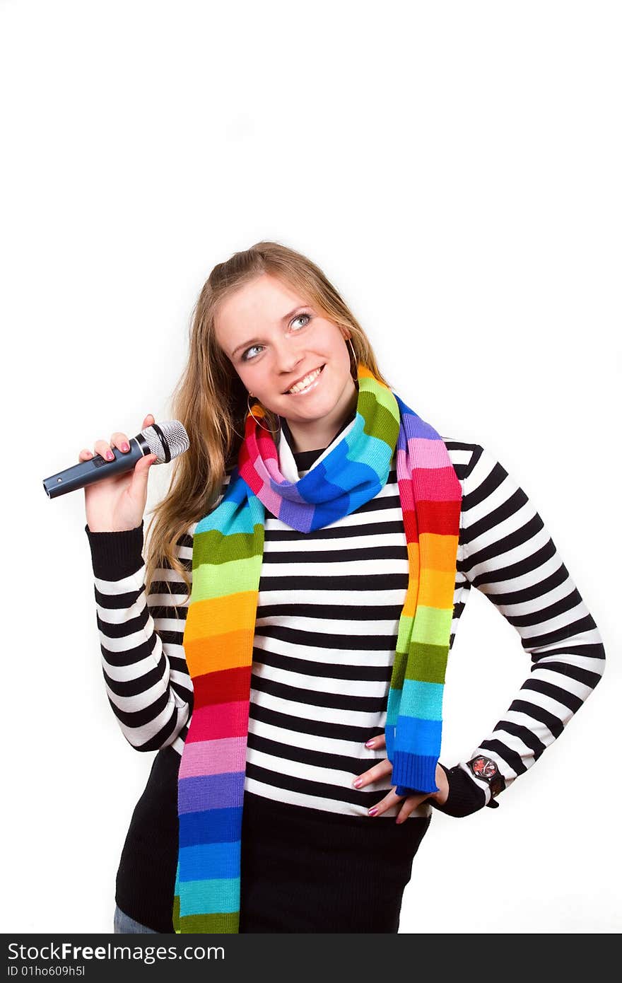 Pretty female with microphone isolated on white