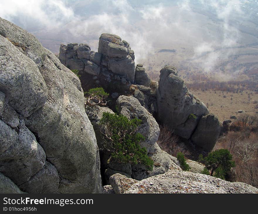 Sunlight Clouds Under Ghosts Vally. Demerdzhi Mountain Rocks, Crimea, Ukraine. Sunlight Clouds Under Ghosts Vally. Demerdzhi Mountain Rocks, Crimea, Ukraine.