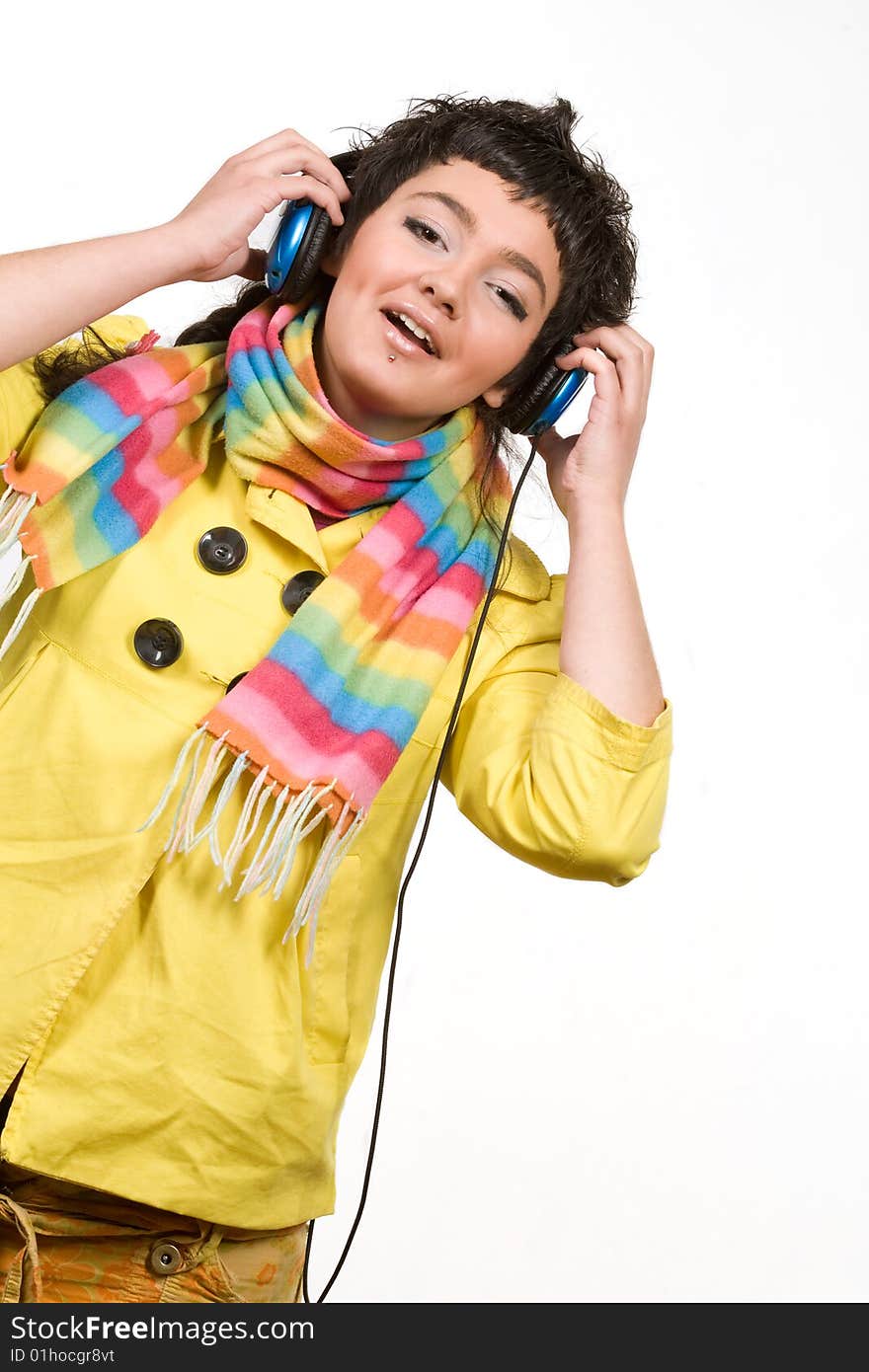 Attractive young woman with headphones over white