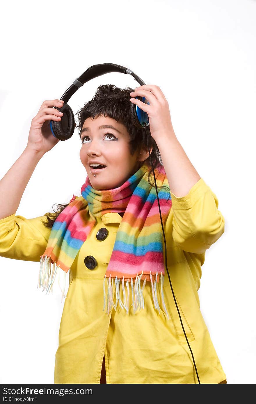 Attractive young girl with headphones over white background. Attractive young girl with headphones over white background