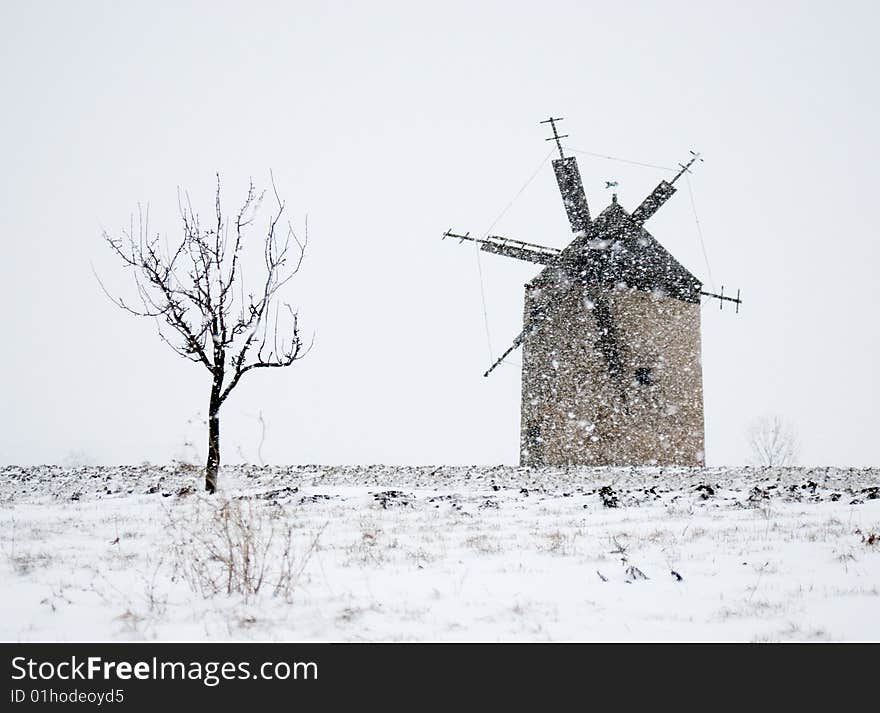 Windmill in snowfall