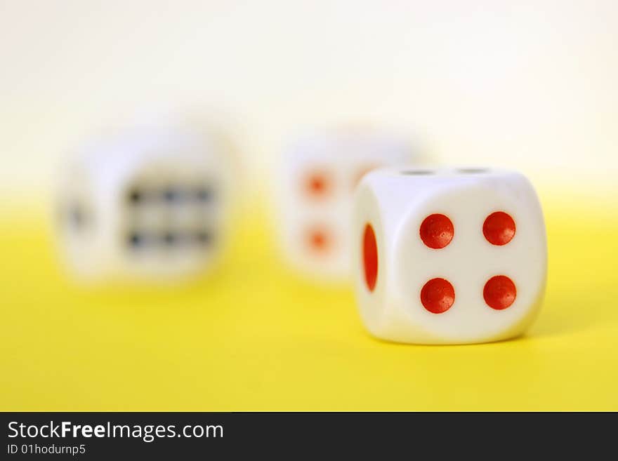 Square dice on color background