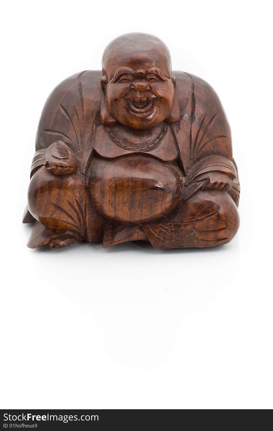 Smiling wooden buddha